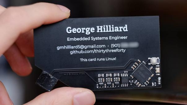A business card with a Linux-based computer is presented